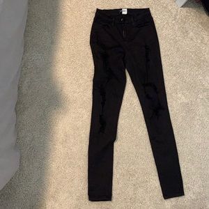 Jet black distressed jeans